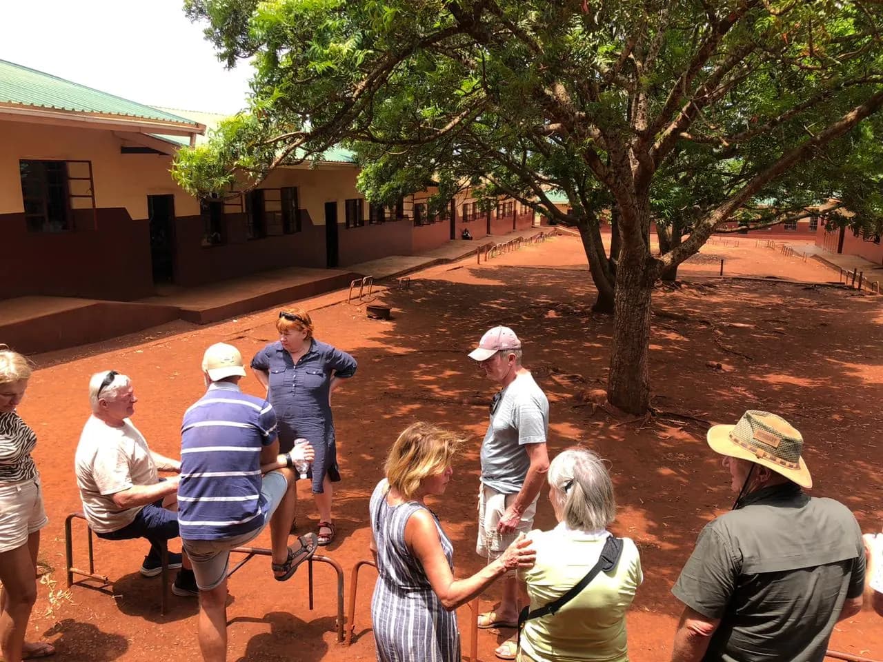 Tour group in a school courtyard